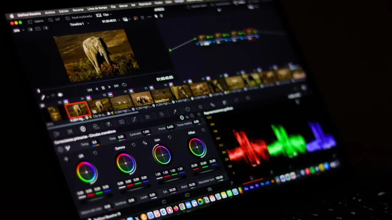 Creator editing video on a laptop with editing software