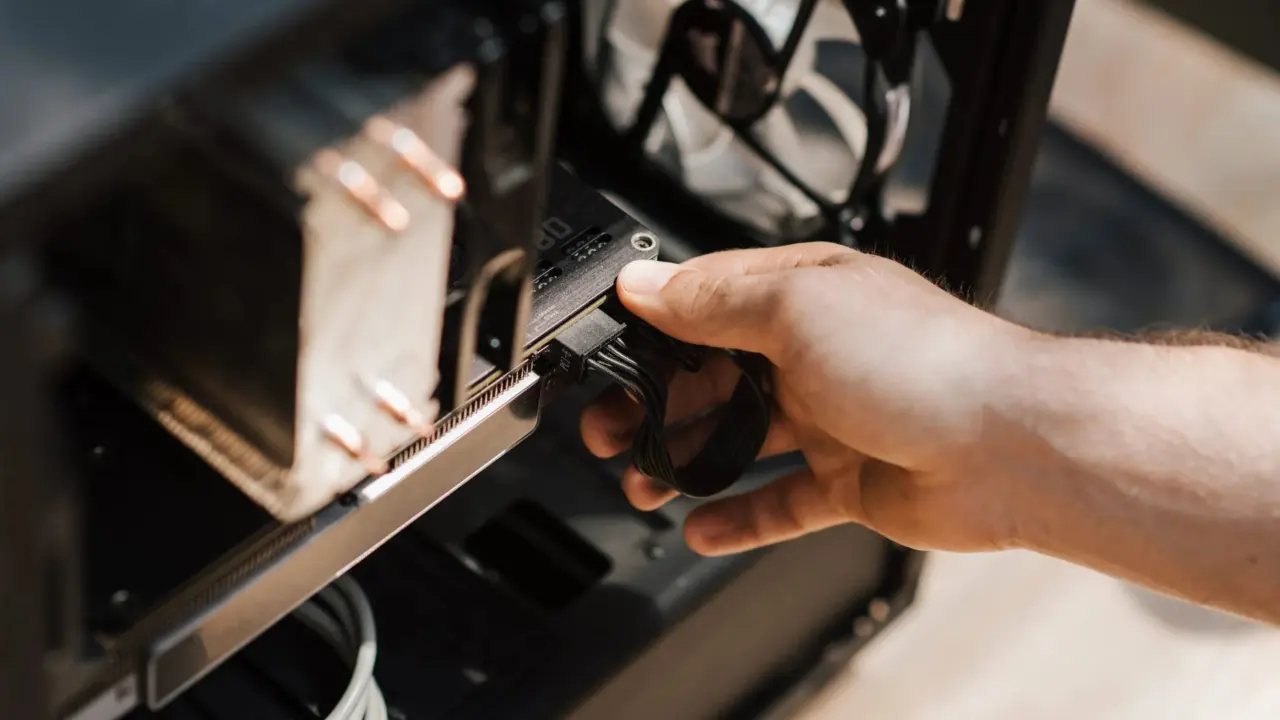 Desktop computer opened for upgrade on a workbench