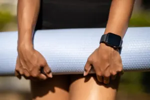 Smartwatch on a wrist showing fitness data